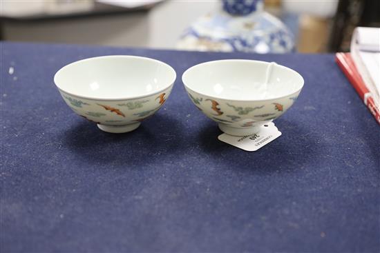A pair of Chinese doucai bat bowls, Yongzheng mark, Republic period, D. 9.7cm, one bowl restored